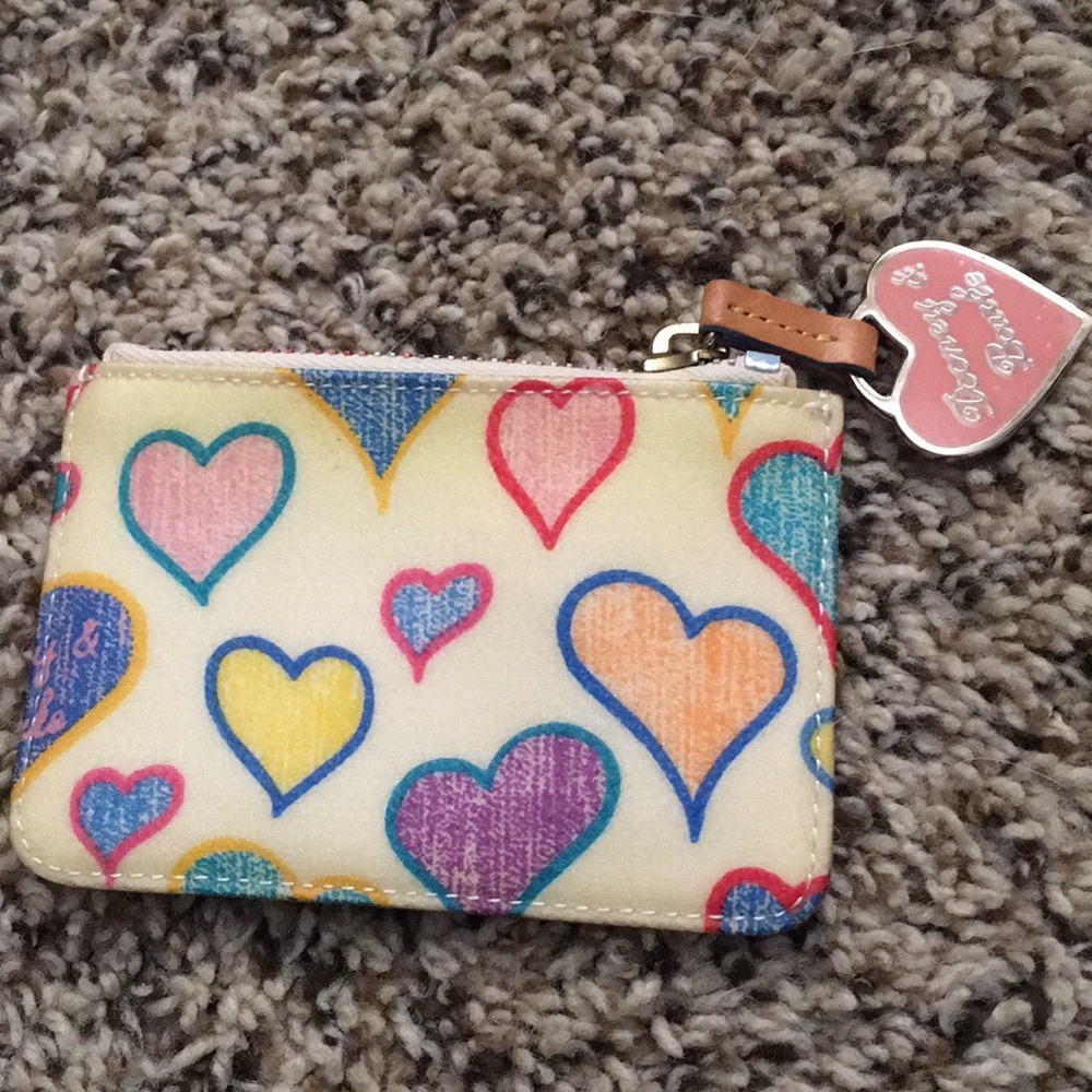 New Dooney & Bourke coin purse in great condition.